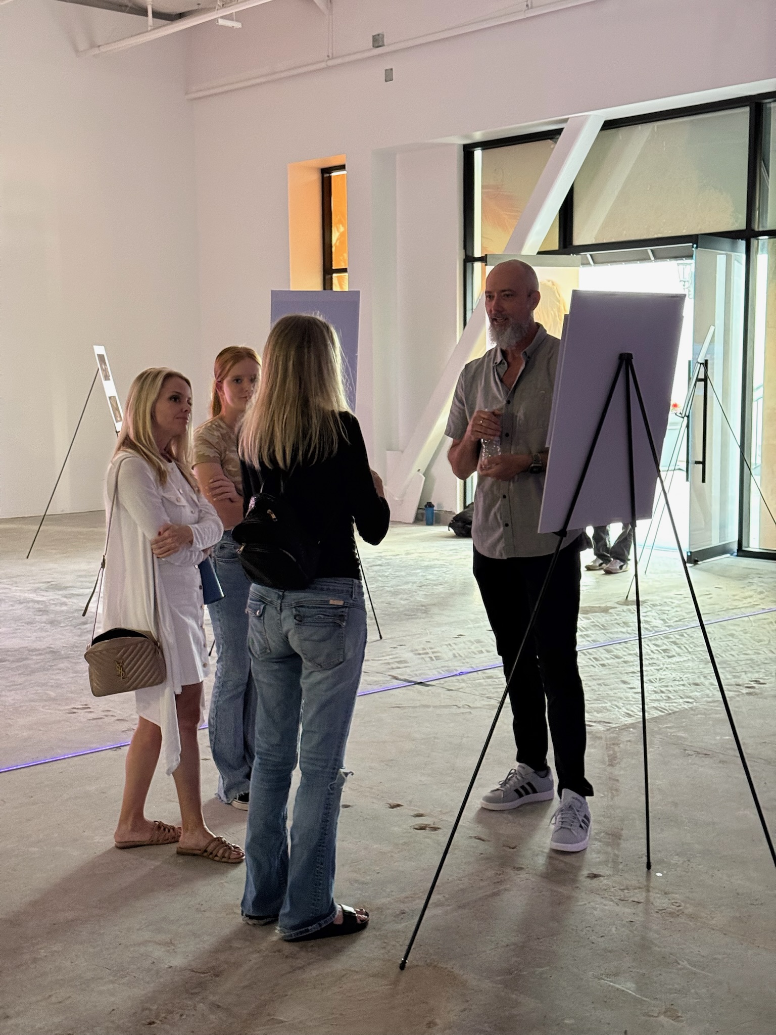 Community gathering at NVRMND immersive wellness open house